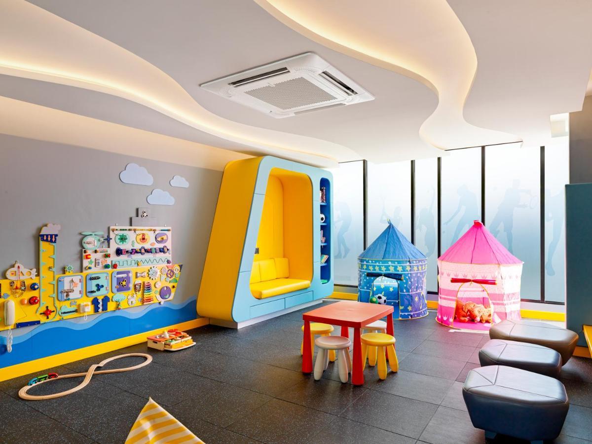 The Oceanic Sportel Phuket - Sha Extra Plus Exterior photo A Daikin air conditioning system installed in a nursery