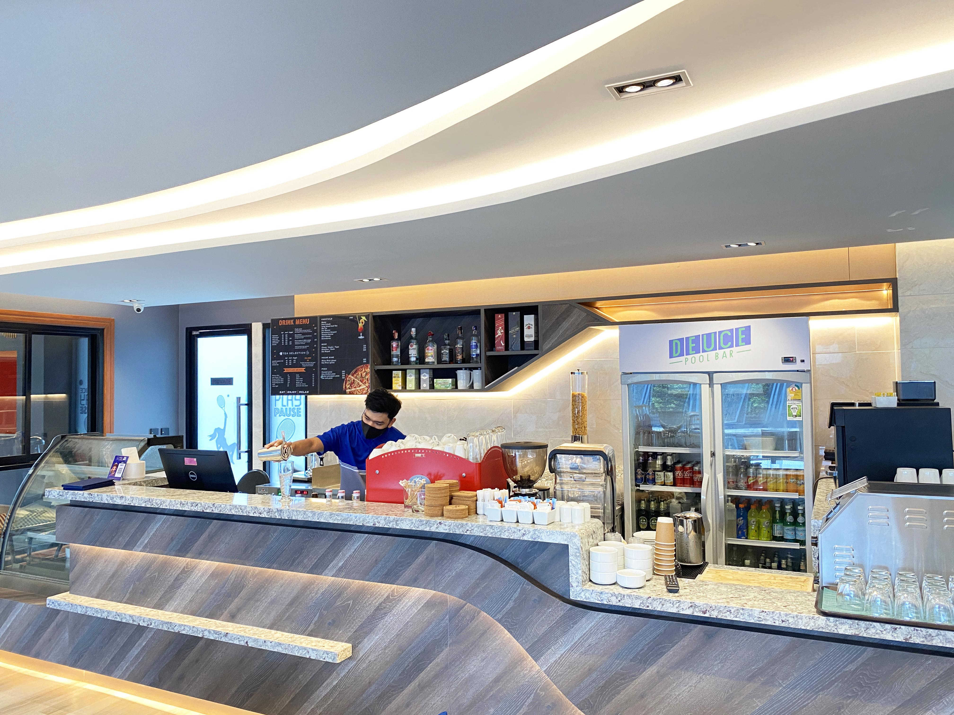 The Oceanic Sportel Phuket - Sha Extra Plus Exterior photo A Starbucks in the airport